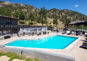 Beautiful river and mountain views prevail from this 3-bedroom, 2-bath condo. in Estes Park