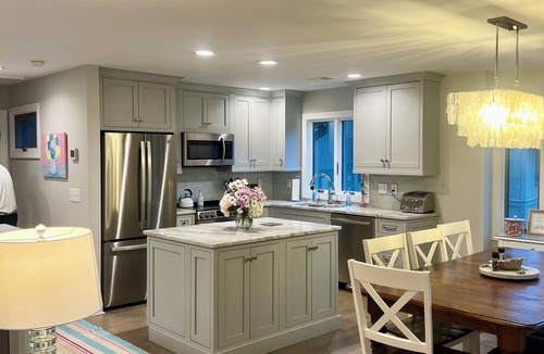 West Beach Villa | 1333 Fairway Oaks: 4BR Villa, Lagoon Views, Short 5-7 min. stroll to the Beach!