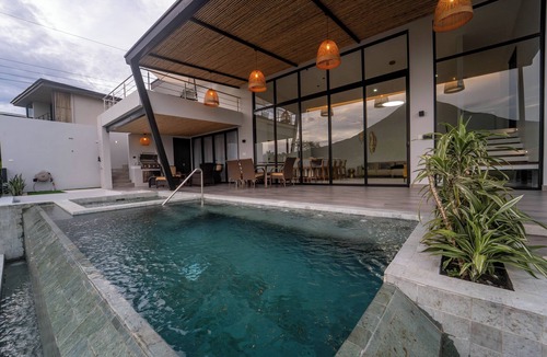 Arenal Hot Springs Villa | Luxury new villa with volcano view, AC, pool, jacuzzi, firepit, laundry, private