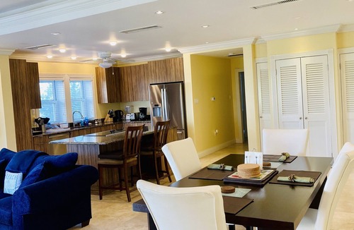 Cotton Ground Condo | “Mango” - Vibrant Villa Yards from BEACH at Hamilton Beach Villas & Spa