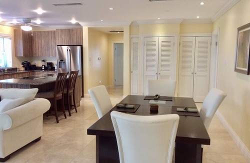 Cotton Ground Condo | “Mango” - Vibrant Villa Yards from BEACH at Hamilton Beach Villas & Spa