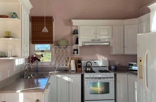Jessups Village Villa | Royal Palm Villas, #1 Location. Minutes to Pinney's Beach, with AC Bedroom