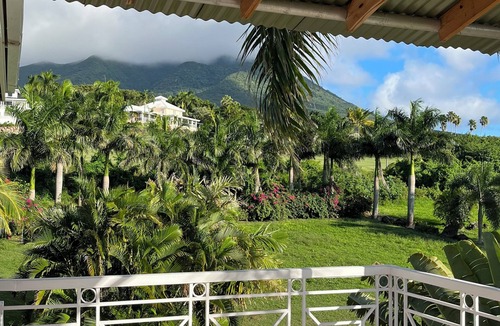 Jessups Village Villa | Royal Palm Villas, #1 Location. Minutes to Pinney's Beach, with AC Bedroom