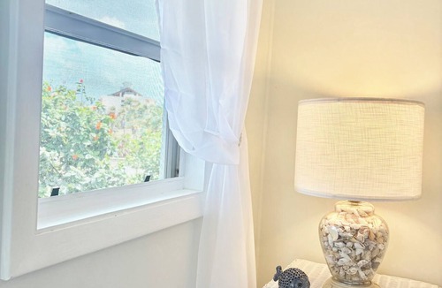 Kittian Village Villa | Steps to Beach, Eats, ATM, Taxi, Pool View, Golf and Grocery store