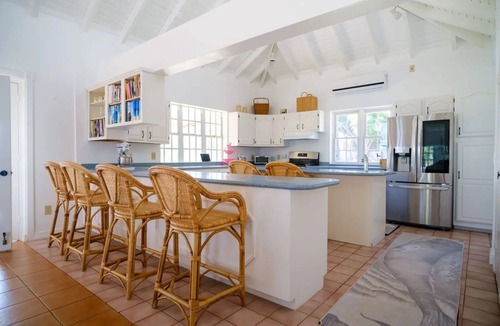 Charlestown Villa | Wake up to ocean views and emerald peaks in this stunning Caribbean sanctuary