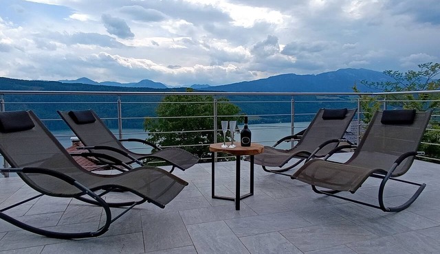 Modern house in the woods with a view of the Millstattersee in millstatt am see
