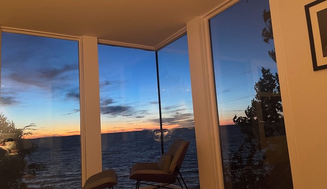 Stunning 6000 sq. ft. Lake Mi contemporary home set on 31/2 acres of sandy beach in Harbor Springs