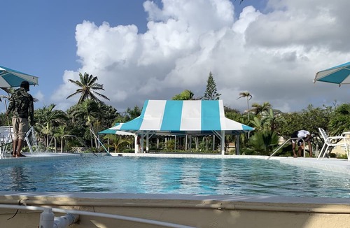 Saint Kitts and Nevis Condo | This cozy condo is just steps from pool & Atlantic Ocean.