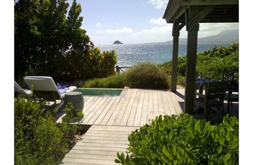 Frigate Bay Cottage | PRIVATE Luxury Oceanfront Beach Bungalow w Exclusive Club Resort Access & Tennis